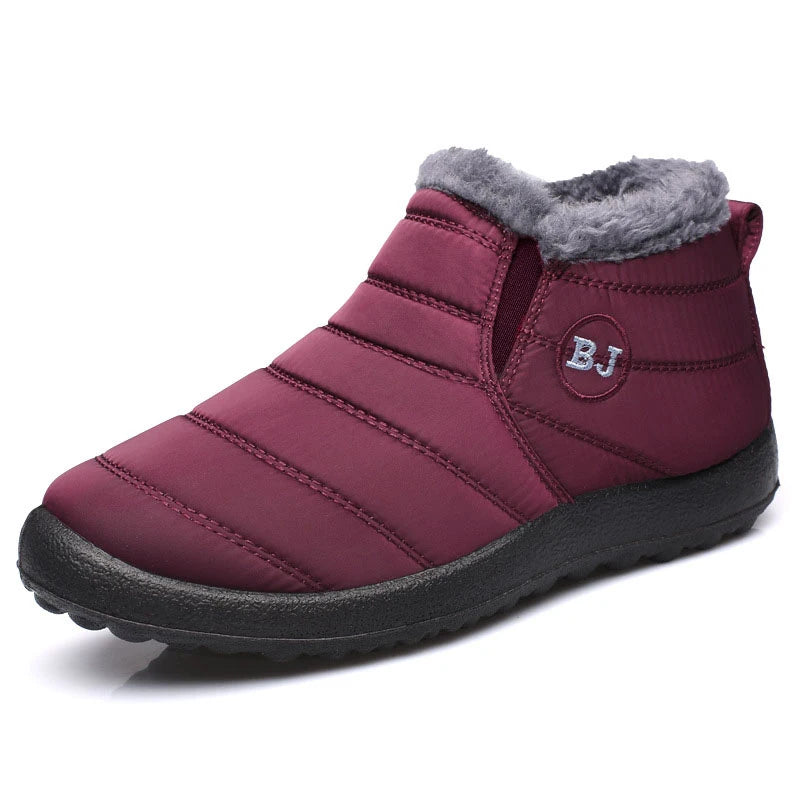 Maroon winter boot with gray fur lining on a white background