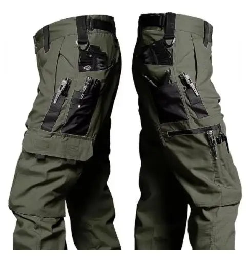 Green tactical pants with multiple pockets and attachments on a white background