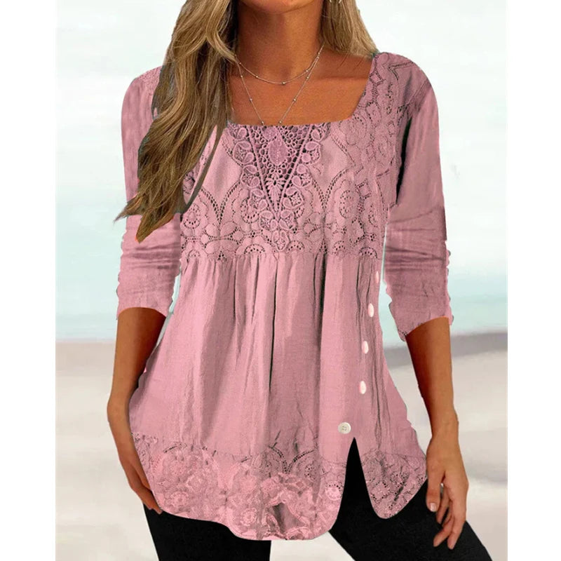 Pink lace top worn by a person on a white background
