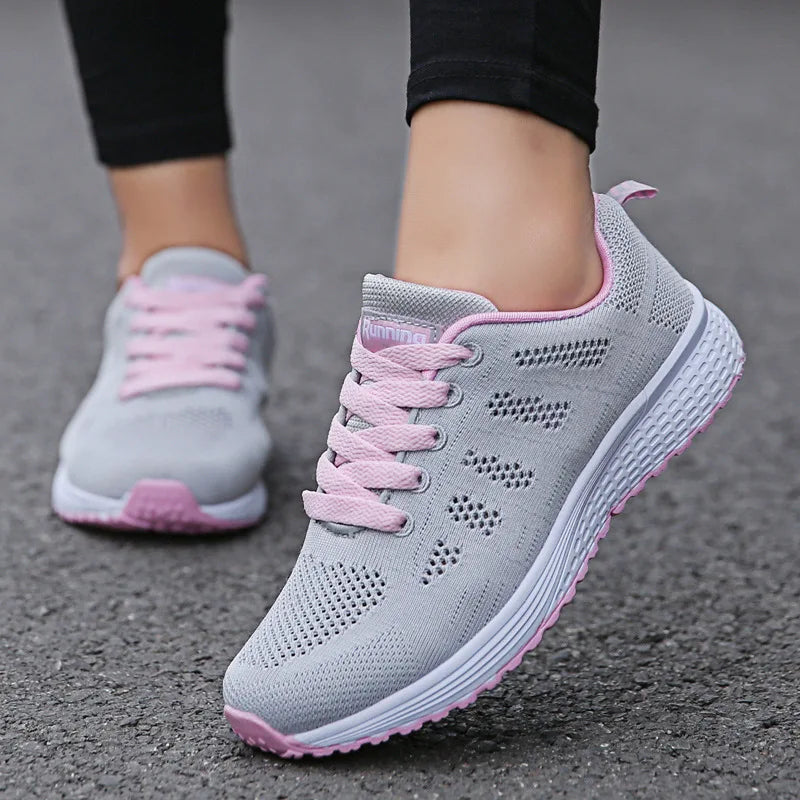 Women’s mesh casual sneakers with breathable design and flat sole, ideal for walking, workouts, or everyday comfort wear.- gray pink