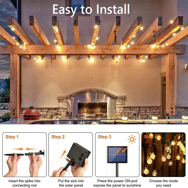Solar-powered crystal globe LED string lights for outdoor décor. outside